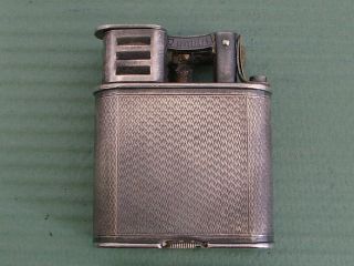 Dunhill Lighter In Silver,  Case 42mm Wide By 50mm High.
