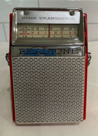 Red Realtone Tr - 970 Transistor Radio In,  Plays Well On Am Band