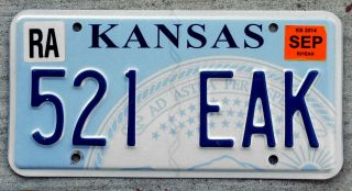 Blue And White Kansas " State Seal " License Plate With A 2014 Sticker