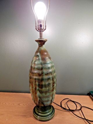GREEN AND BROWN DRIP GLAZE MCM POTTERY TABLE LAMP. 2