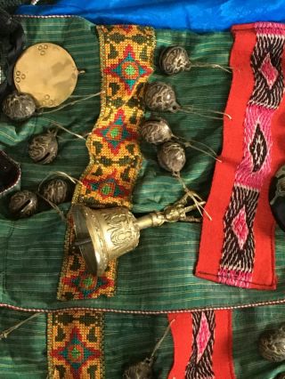 Shaman coat,  toli mirrors,  tiger bells,  horn and regalia. 5