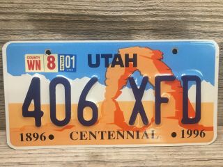 Utah Centennial License Plate Featuring Arches National Park With A 2001 Sticker