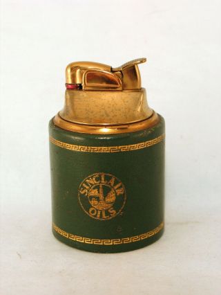 Green Cylindrical Gold Toned Evans Table Lighter With Sinclair Oil Logo Ad