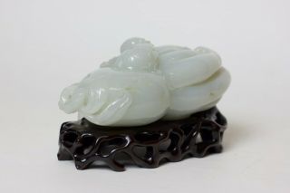 Chinese carved white jade Buddha ' s hand and figure resting on top,  China 3