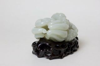Chinese carved white jade Buddha ' s hand and figure resting on top,  China 4