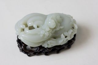 Chinese carved white jade Buddha ' s hand and figure resting on top,  China 5