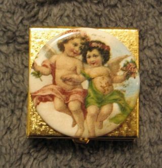 Vintage Gold Tone Medicine Pill Box Container W/ Porcelain Cameo Of A Twin