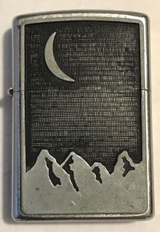 1999 Zippo Cigarette Lighter Crescent Moon Over Mountains Design