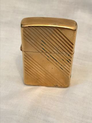 1989 Zippo Lighter Gold Colored Chrome Line Etched.
