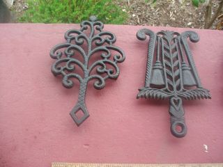 Set Of 7 Antique Griswold Cast Iron Advertising Trivets All Different & Marked