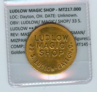 Magicians Token Mt217.  000 - Ludlow Magic Shop
