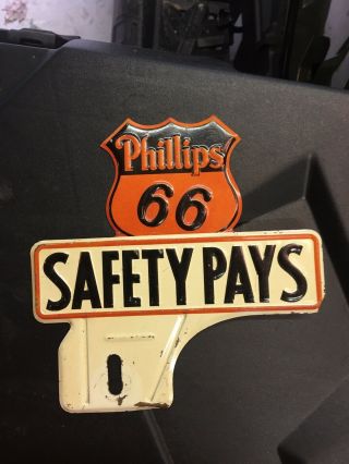 Near Phillips 66 License Plate Topper