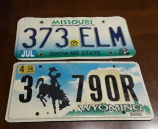 2 Car License Plates Authentic Metal Missouri 09 & Wyoming 06