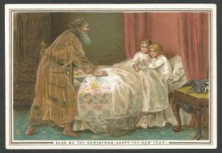 W24 - Children With Ghost Santa - De La Rue Series No 216 - Victorian 1880 Card