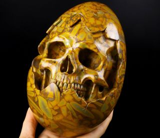 7.  1 " Bamboo Stone Carved Crystal Skull Inside Egg Sculpture