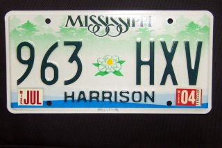 963 Hxv = Natural July 2004 Harrison County Mississippi License Plate