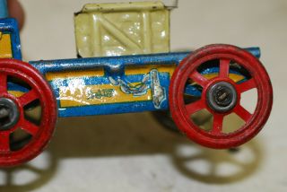 Penny toy (tin) candy container,  horses pulling wagon,  antique,  4 5/8 