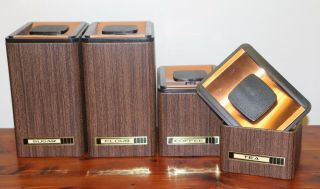 Vintage 4 Piece Set Kromex Stackable Metal Wood Grain Canisters Copper Tops