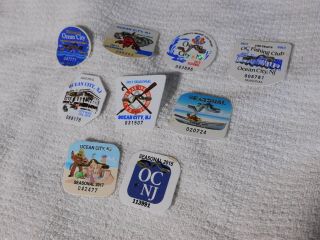 9 Vintage Obsolete Ocean City,  Nj Seasonal Beach Tags Badges,  2010 - 2018,  Vgc