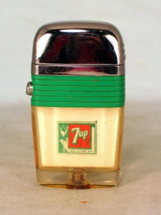 Scripto Lighter With 7up Ad On Front,  The 7up Woodpecker On The Reverse