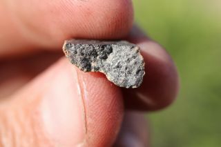 Lunar Meteorite NWA 11474 Meteorite end cut.  8 grams 2