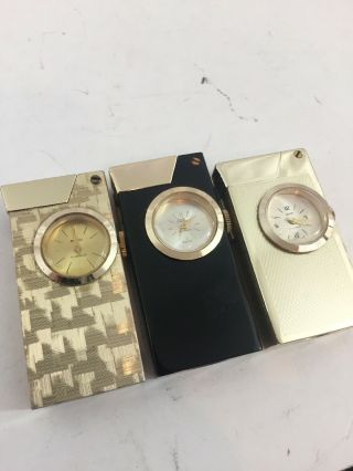 3 Vintage Rivo Pocket Lighters With Watches