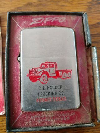 2 Vintage Zippo lighters w/ advertising age unknown but says pat pend on one 2