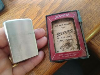 2 Vintage Zippo lighters w/ advertising age unknown but says pat pend on one 6