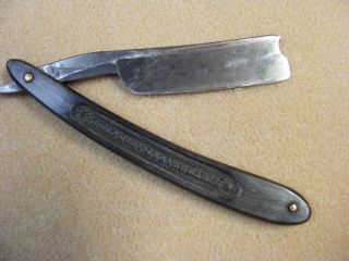 vintage wade & butcher straight razor with a 3/4 inch wide blade 4