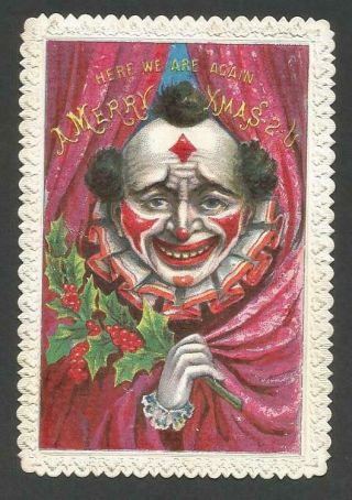W33 - Clown Holding Holly Appears Thru Curtain - Victorian Xmas Card