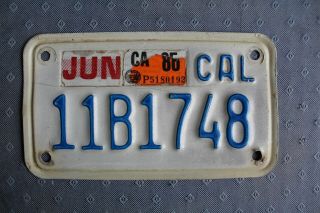 California White And Blue Motorcycle License Plate
