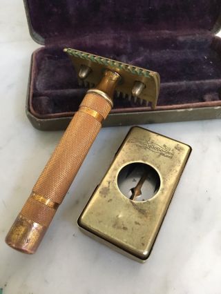 Vintage Gillette Safety Razor,  gold tone with fat round handle,  complete. 4