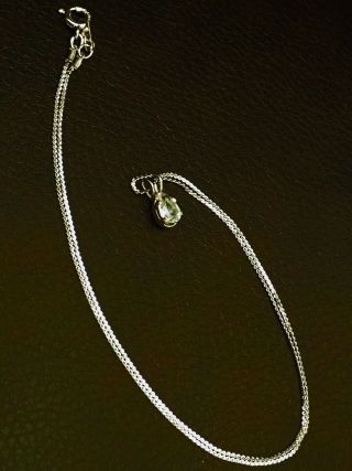 A Sterling Silver Necklace With Stone Pendant