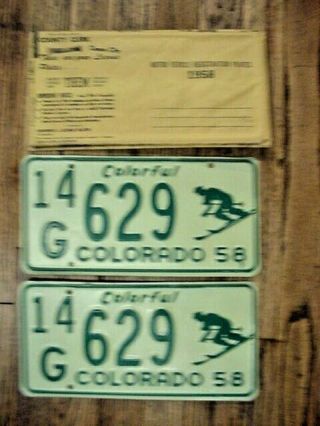 Pair 1958 Colorado Skier License Plate 14 - G - 629