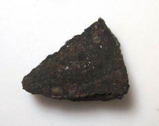1.  6 Gram Slice Overland Park - Kansas H4 Chondrite Meteorite