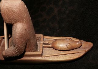 An Exceptional Signed Canadian Eskimo Wood Sculpture of a Seal Hunter 15 