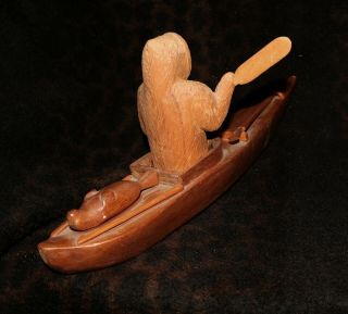 An Exceptional Signed Canadian Eskimo Wood Sculpture of a Seal Hunter 15 