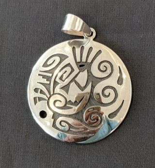Sterling Silver,  Handmade,  Kokopelli Pendant By Hopi Master Ruben Saufkie