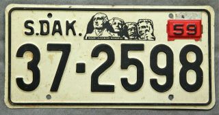 South Dakota 1957.  1959 Metal Tag.  License Plate.  Hutchinson County.