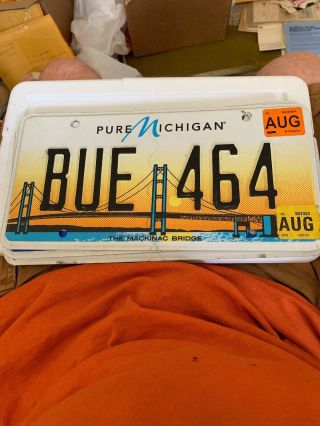 Pure Michigan License Plate Featuring Mackinac Bridge.  Bue 464.