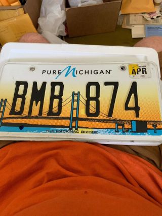 Pure Michigan License Plate Featuring Mackinac Bridge.  Bmb 874.