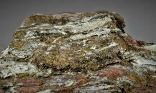 Sussexite on rhodonite with bementite - Franklin,  NJ 6