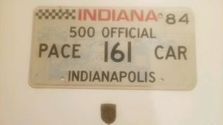 1984 Indy 500 Pace Car License Plate And V.  I.  P.  Bronze Press Pin.