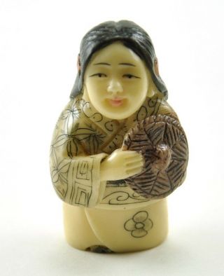 Vintage Chinese/ Japanese Happy Lucky Farmer Girl Scrimshaw Resin Netsuke 1.  75 "
