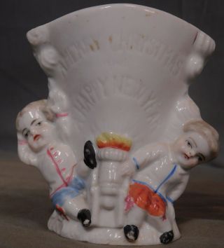 Antique Staffordshire German Porcelain Christmas Fairing Vase Boys Cannon Blast