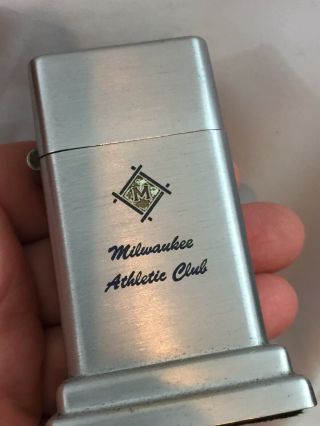2 Barcroft Zippo Table Lighters - Both Advertising The Milwaukee Athlete Club 2