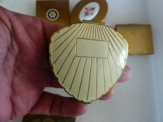 Vintage powder compacts 8 and 1 case 6