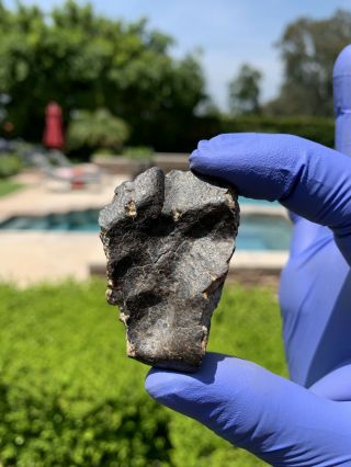 Meteorite NWA,  Unclassified 68.  63 Grams W/Regmaglypts 4