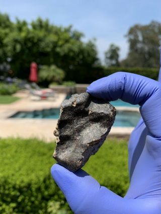 Meteorite NWA,  Unclassified 68.  63 Grams W/Regmaglypts 6
