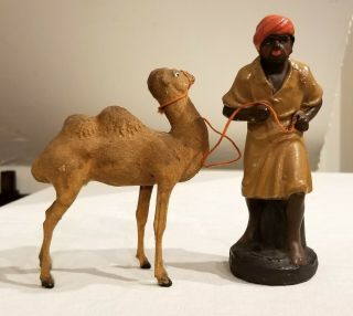 Early 1900s Camel Tender,  Rope,  with Composition Camel.  German. 3